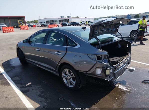 5NPE34AF1JH724386 2018 HYUNDAI SONATA Gray Trasero izquierdo