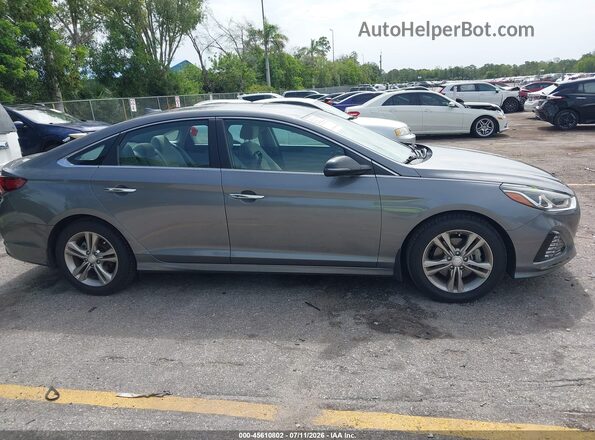 5NPE34AF2KH769838 2019 HYUNDAI SONATA Gray Вид задньої частини салону