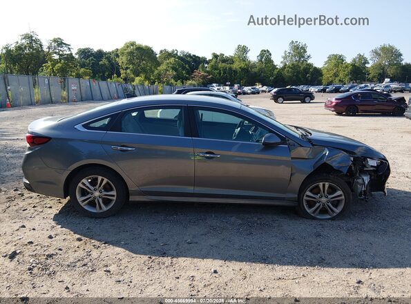 5NPE34AF3JH661260 2018 HYUNDAI SONATA Gray Widok wnętrza z tyłu