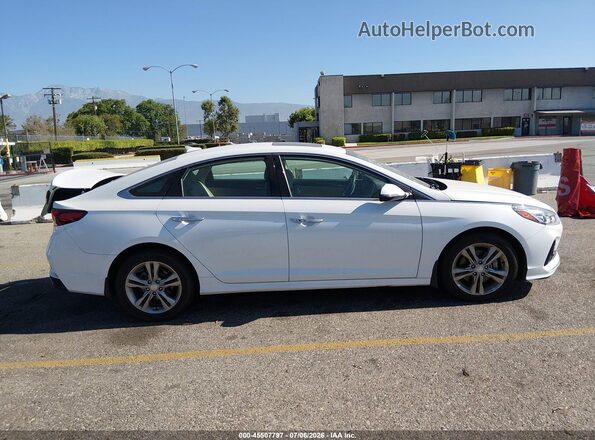 5NPE34AF4JH648999 2018 HYUNDAI SONATA White Вид задньої частини салону