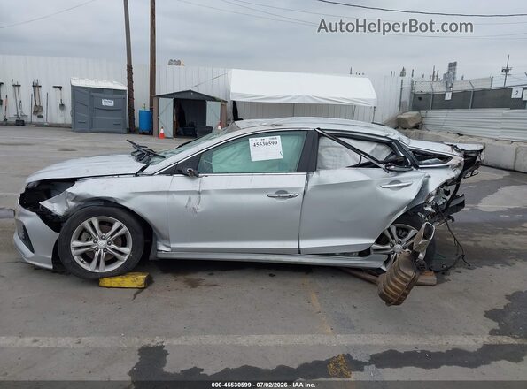 5NPE34AF5JH669571 2018 HYUNDAI SONATA Silver Rear interior view