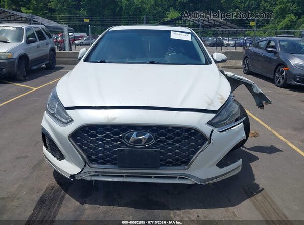 5NPE34AF5JH712290 2018 HYUNDAI SONATA White Вид задньої частини салону