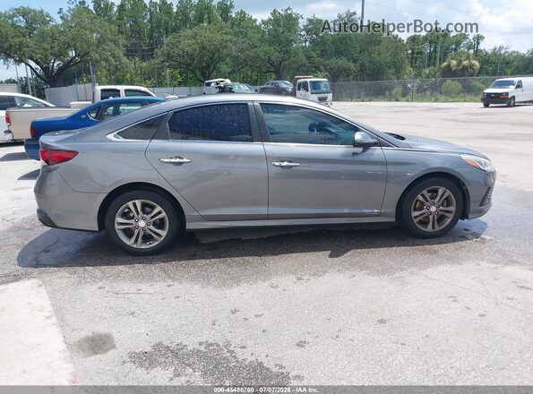5NPE34AF6KH741346 2019 HYUNDAI SONATA Gray Vista interior trasera