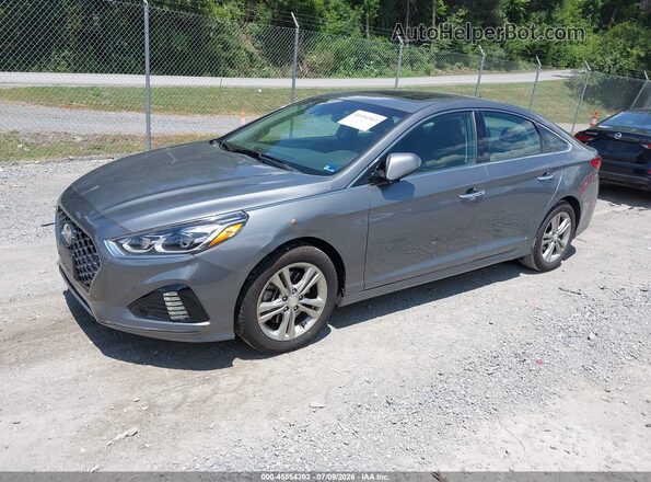 5NPE34AF6KH753268 2019 HYUNDAI SONATA Silver Vista tres cuartos delantera izquierda