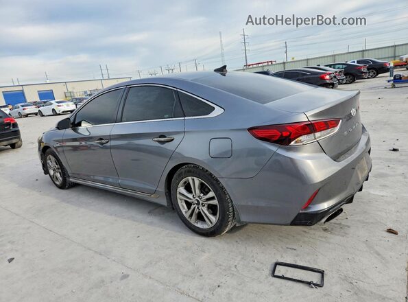 5NPE34AF6KH757854 2019 HYUNDAI SONATA Gray Trasero izquierdo