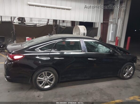 5NPE34AF6KH805322 2019 HYUNDAI SONATA Black Widok wnętrza z tyłu