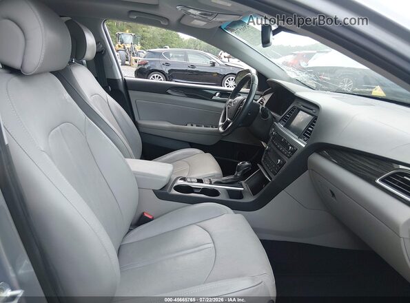 5NPE34AF7GH288989 2016 HYUNDAI SONATA Серебряный Вид салона спереди