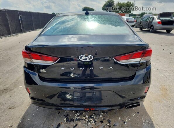 5NPE34AF7JH639617 2018 HYUNDAI SONATA Black Rear view