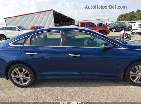 5NPE34AF7KH729383 2019 HYUNDAI SONATA Синий Вид задней части салона