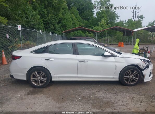 5NPE34AF8JH603354 2018 HYUNDAI SONATA White Rear interior view