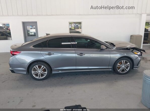 5NPE34AF8JH680564 2018 HYUNDAI SONATA Gray Widok wnętrza z tyłu