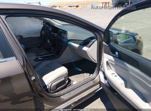 5NPE34AF9GH424331 2016 HYUNDAI SONATA Коричневый Вид салона спереди