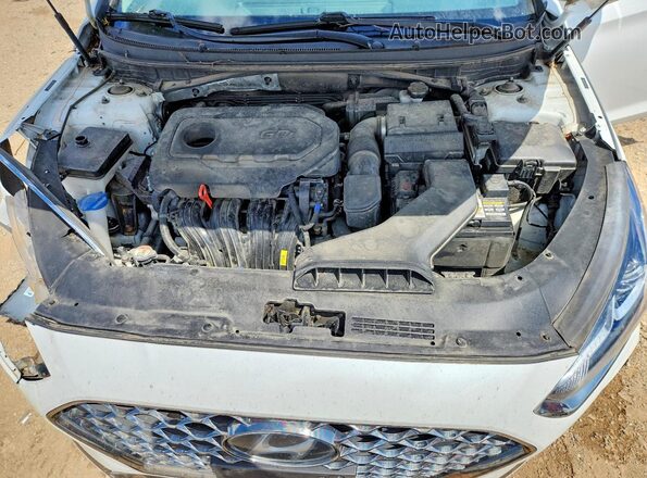 5NPE34AF9JH710588 2018 HYUNDAI SONATA White Widok wnętrza z tyłu