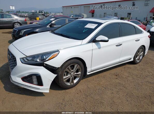 5NPE34AF9KH801040 2019 HYUNDAI SONATA White Vista tres cuartos delantera izquierda