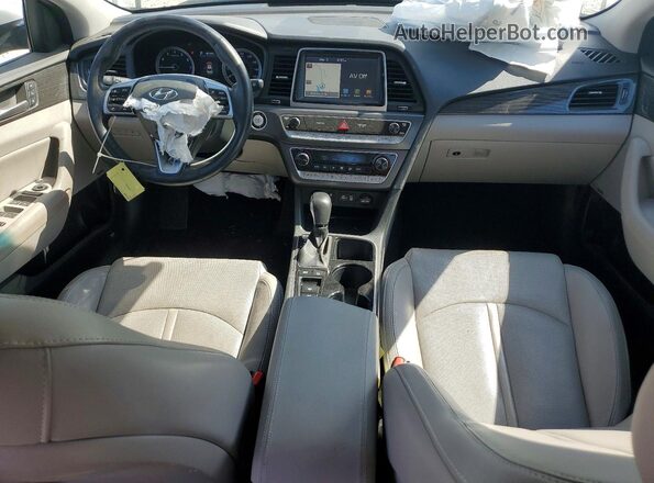 5NPE34AFXKH737722 2019 HYUNDAI SONATA Серебряный Вид панели приборов