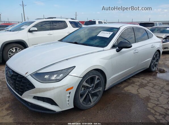 5NPEJ4J27MH109896 2021 HYUNDAI SONATA White წინა მარცხენა ხედი სამი მეოთხედიდან