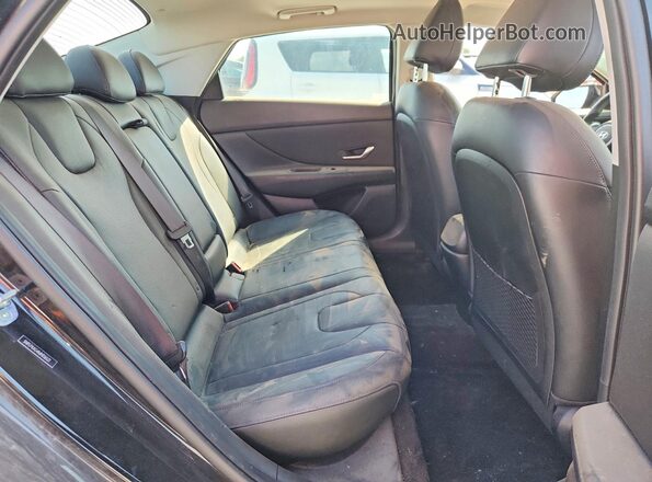 5NPLP4AG4MH036522 2021 HYUNDAI ELANTRA Black Rear seats view