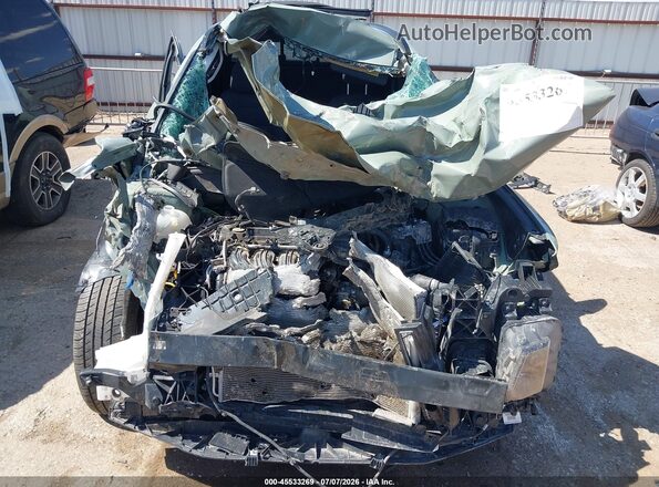5NTJCDDEXRH112315 2024 HYUNDAI SANTA CRUZ Green Rear interior view