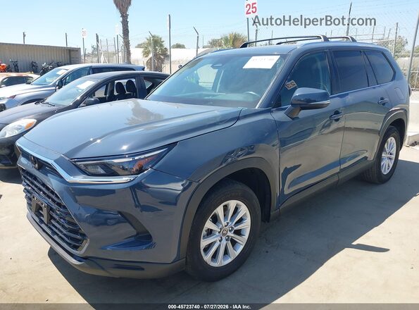5TDAAAA59RS015950 2024 TOYOTA GRAND HIGHLANDER Blue Front left