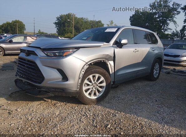 5TDAAAB57TS104471 2026 TOYOTA GRAND HIGHLANDER Silver Vista tres cuartos delantera izquierda