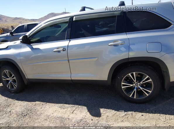 5TDBZRFH2KS973722 2019 TOYOTA HIGHLANDER Silver Vista interior trasera