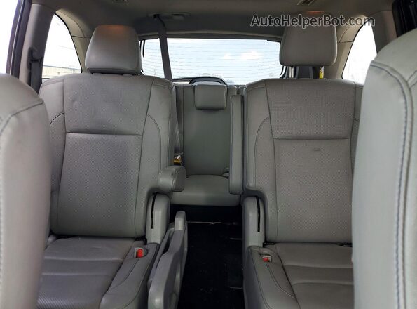 5TDDZRFH2KS950689 2019 TOYOTA HIGHLANDER White Rear seats view