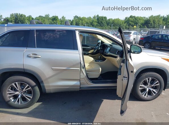 5TDJKRFH4GS294364 2016 TOYOTA HIGHLANDER Gold წინა სალონის ხედი