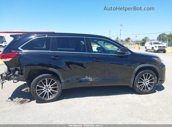 5TDJZRFH1JS562516 2018 TOYOTA HIGHLANDER Black Rear interior view