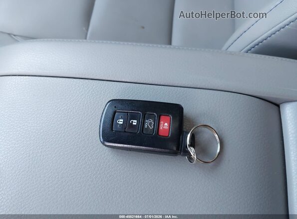 5TDJZRFH3HS473878 2017 TOYOTA HIGHLANDER Beige Вид панелі приладів