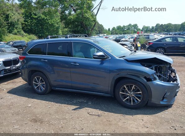 5TDJZRFH3HS483620 2017 TOYOTA HIGHLANDER Синий Вид задней части салона