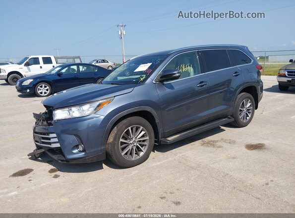 5TDJZRFH5KS976724 2019 TOYOTA HIGHLANDER Blue Vista tres cuartos delantera izquierda