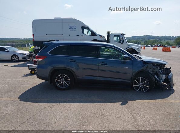 5TDJZRFH5KS976724 2019 TOYOTA HIGHLANDER Blue Vista interior trasera