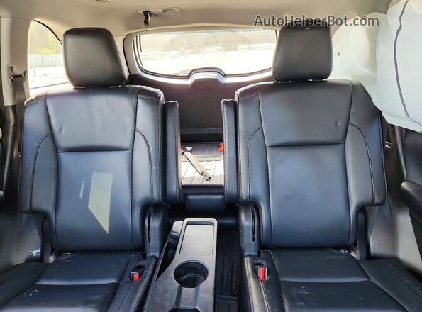 5TDJZRFH9JS905993 2018 TOYOTA HIGHLANDER Black Vista de los asientos traseros