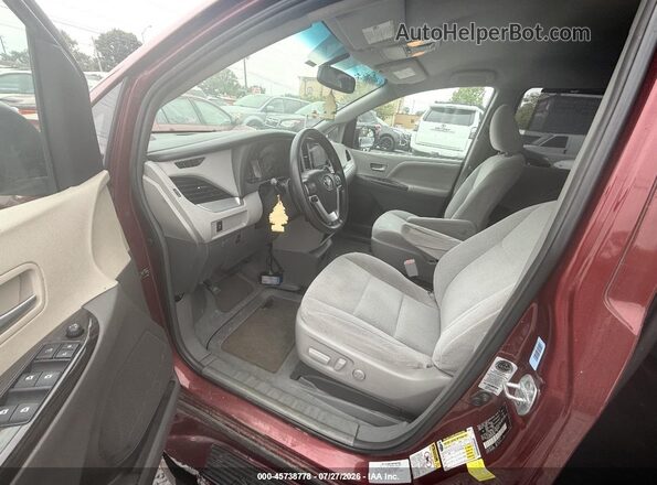 5TDKZ3DC0HS845833 2017 TOYOTA SIENNA Red Widok wnętrza z przodu