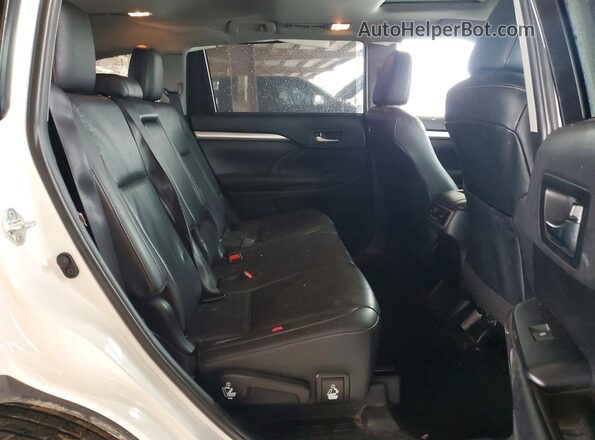 5TDKZRFH1KS569102 2019 TOYOTA HIGHLANDER Белый Вид задней части салона