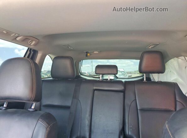 5TDKZRFH3KS345426 2019 TOYOTA HIGHLANDER Tan Vista de los asientos traseros