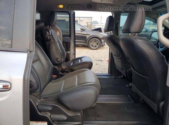 5TDXK3DC1GS742395 2016 TOYOTA SIENNA Silver Vista interior trasera