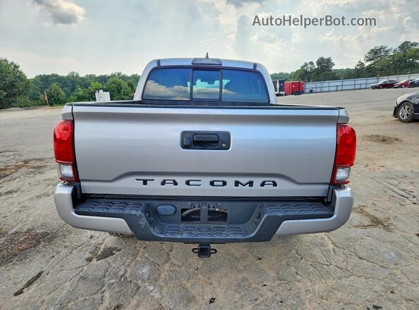 5TFAX5GN2JX116078 2018 TOYOTA TACOMA Silver Rear view