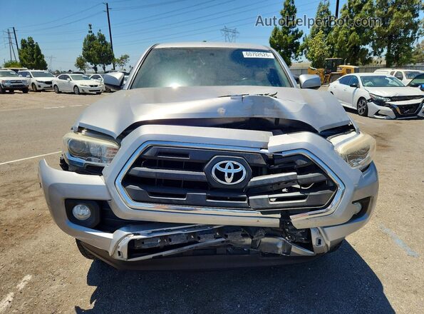 5TFAX5GN7HX093424 2017 TOYOTA TACOMA Silver Front view