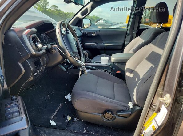 5TFAZ5CN8KX080284 2019 TOYOTA TACOMA Gray Front interior view