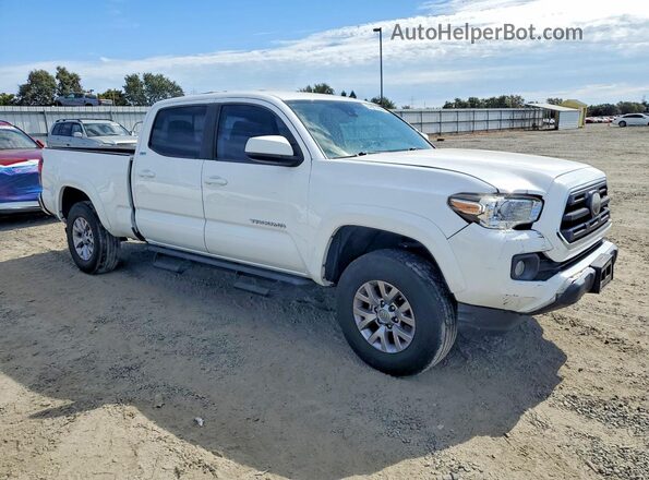 5TFBZ5DN1KX004747 2019 TOYOTA TACOMA White Front right