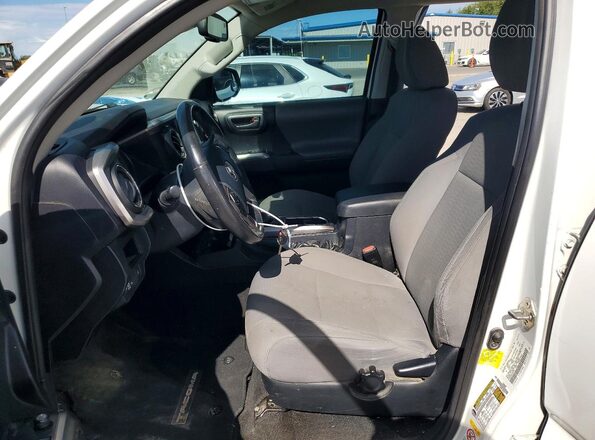 5TFBZ5DN1KX004747 2019 TOYOTA TACOMA White Front interior view