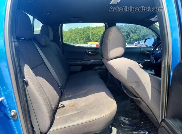 5TFCZ5AN0HX100564 2017 TOYOTA TACOMA Blue Vista de los asientos traseros
