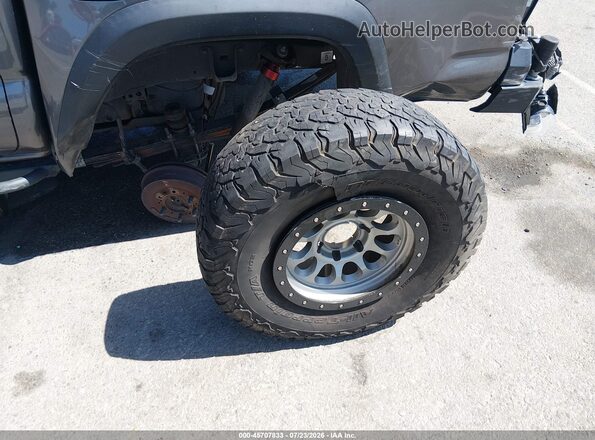 5TFCZ5AN2GX023243 2016 TOYOTA TACOMA Gray Սարքավորումների վահանակի տեսք