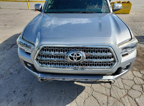 5TFCZ5AN2HX089907 2017 TOYOTA TACOMA Silver Vista interior trasera
