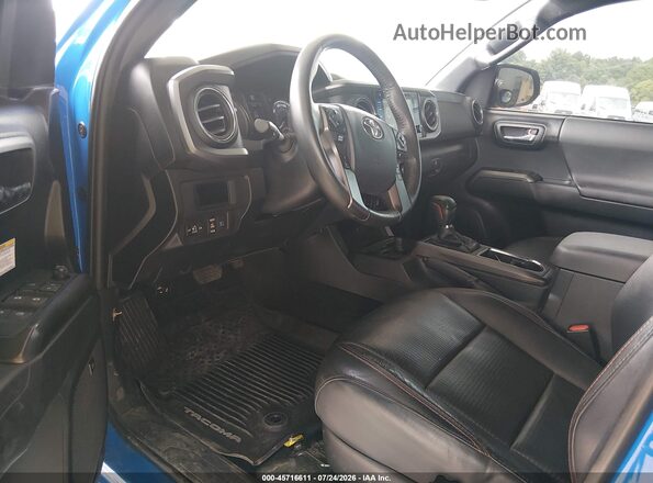 5TFCZ5AN2KX183504 2019 TOYOTA TACOMA Blue წინა სალონის ხედი