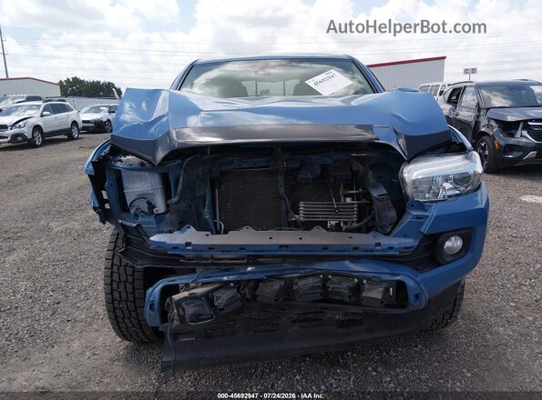 5TFCZ5AN3KX201167 2019 TOYOTA TACOMA Blue Вид задньої частини салону