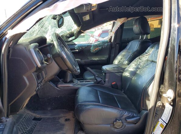 5TFCZ5AN7KX209708 2019 TOYOTA TACOMA Black Front interior view