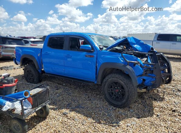 5TFCZ5AN8KX169199 2019 TOYOTA TACOMA Blue Front right