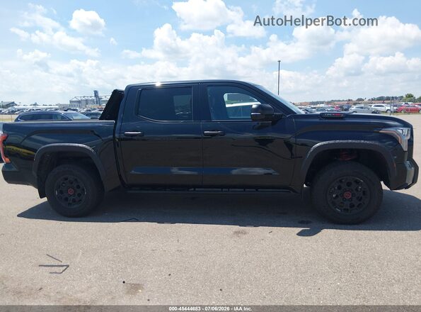 5TFPC5DB3TX127416 2026 TOYOTA TUNDRA HYBRID Black Widok wnętrza z tyłu